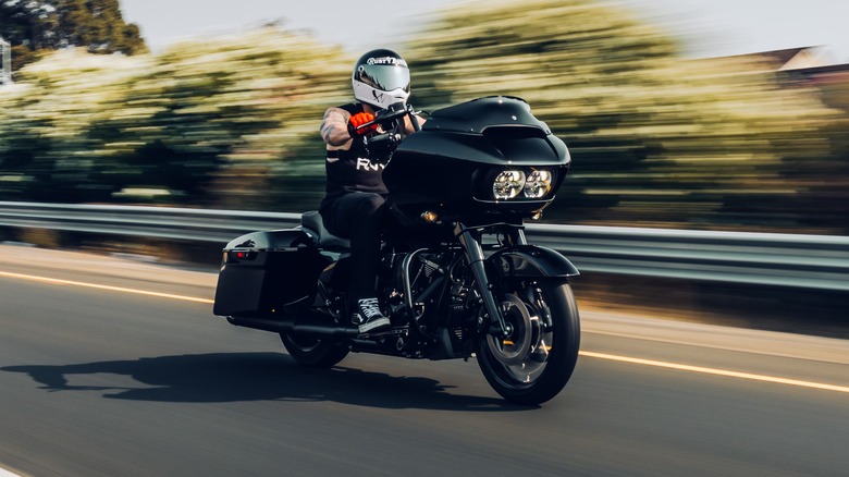 Biker driving Harley-Davidson motorcycle