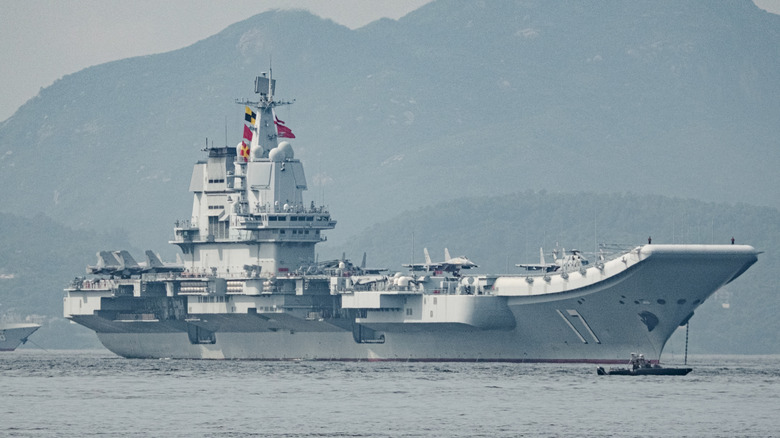 Chinese Navy aircraft carrier Shandong docks at Hong Kong Special Administrative Region waters