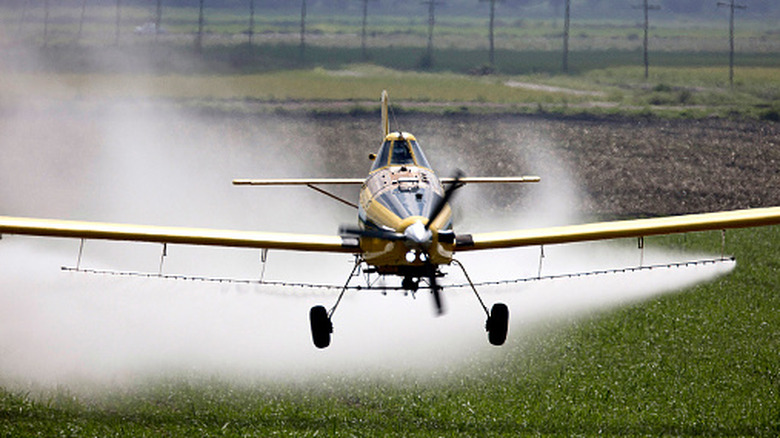 Crop duster aircraft in flight