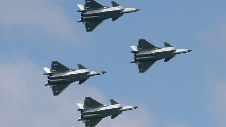 Four J-20s flying in close formation