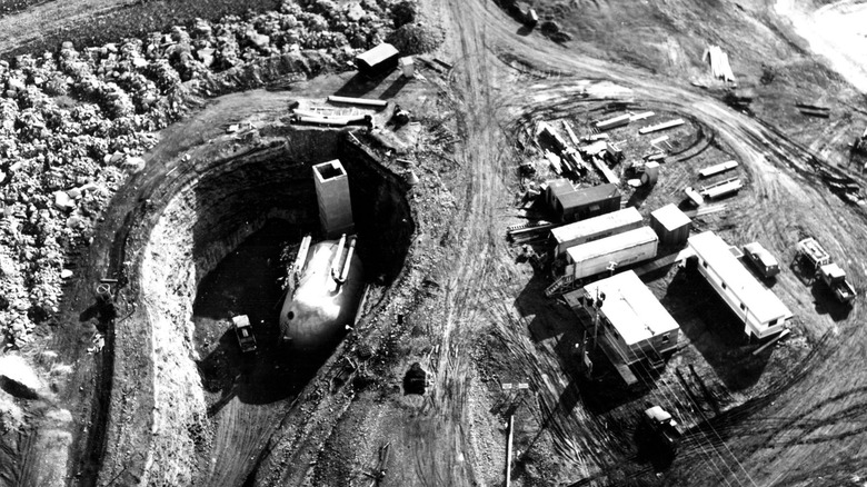 A Launch Control Facility under construction near Malmstrom AFB, Wyo. Cold War requirements to build up U.S. nuclear defenses speeded up Minuteman site construction. Builders often labored year-round in three shifts, seven days a week. The Army Corps of Engineers Ballistic Missile Construction Office and its contractors built 1,000 silos between 1961 and 1966.