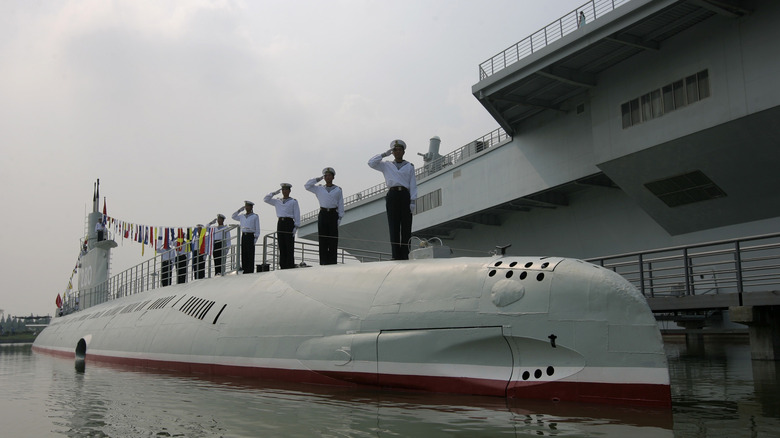 Chinese navy crew saluting