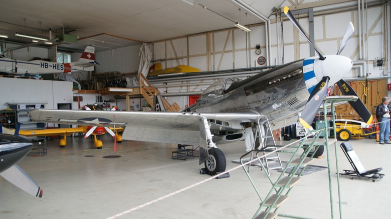 A P-51D Mustang in a hangar