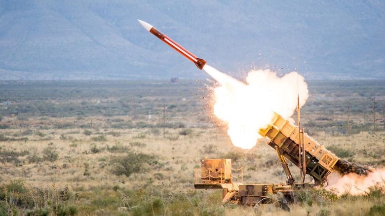 A Patriot Missile firing from a launcher in the desert