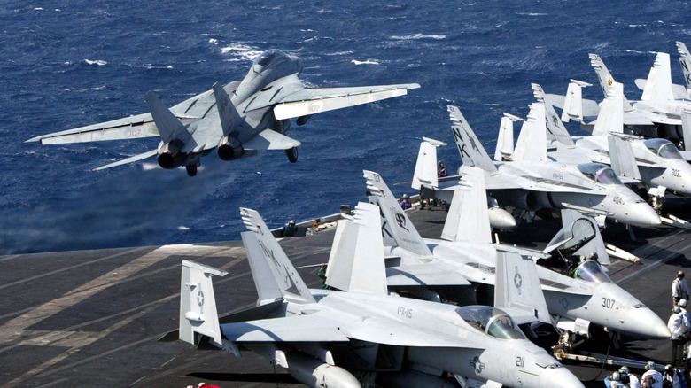 A US plane taking off from an aircraft carrier