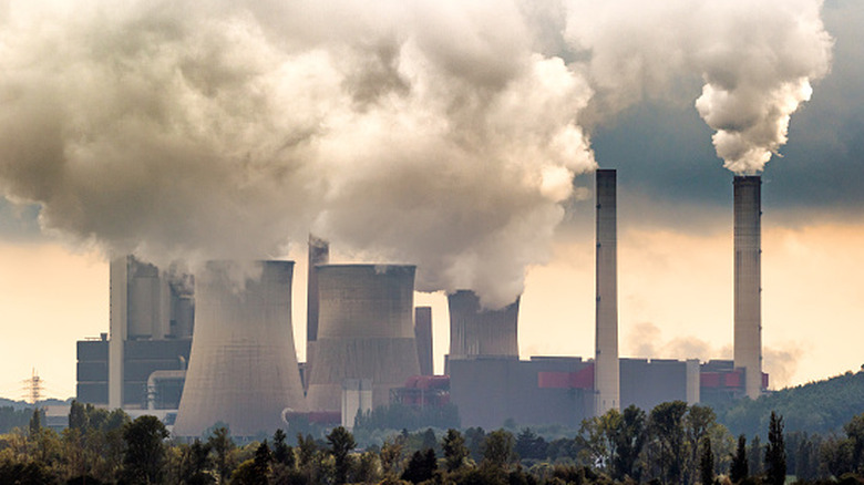 A coal plant shown belching smoke into the sky