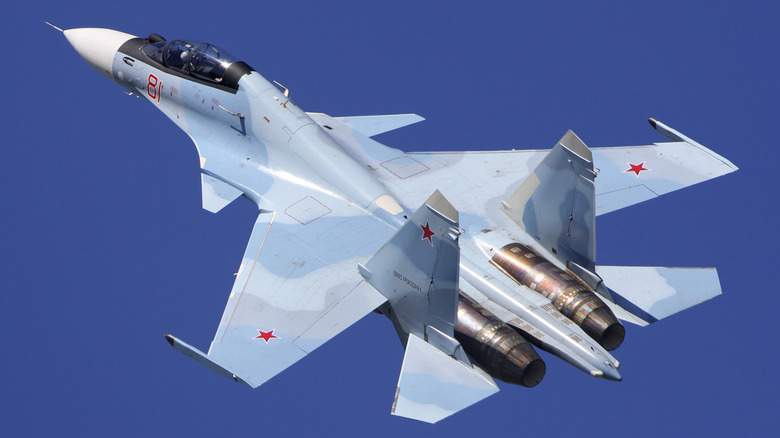 A Russian Air Force Su-30SM Flanker flying over blue skies