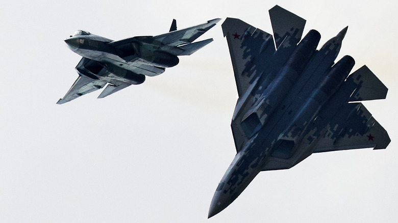 Sukhoi Su-57 fighters operating closely in a flight demonstration