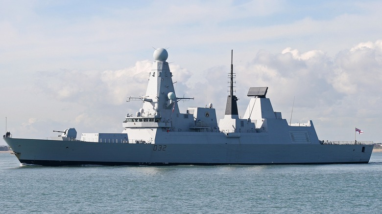 The HMS Daring (D32) outbound from Portsmouth Naval Base, U.K.