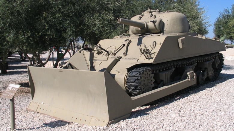 M4 with 105 mm howitzer and an M1 dozer blade on display