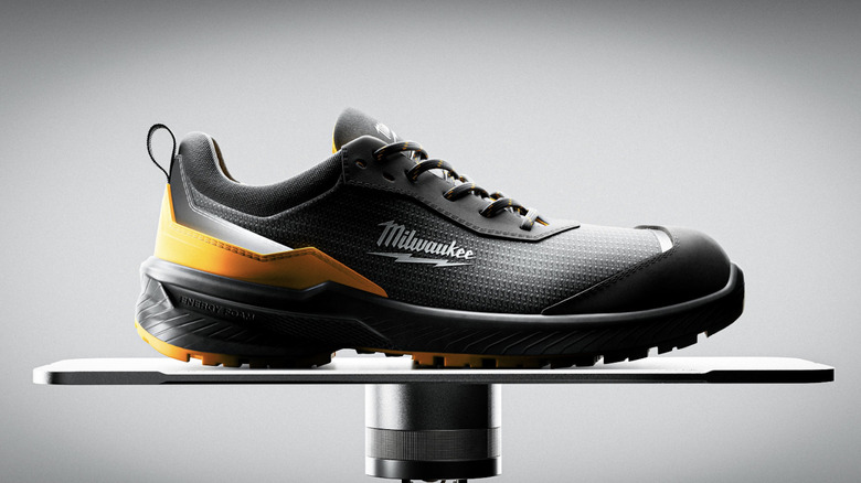 Milwaukee Flextread trainers being weighed on a scale