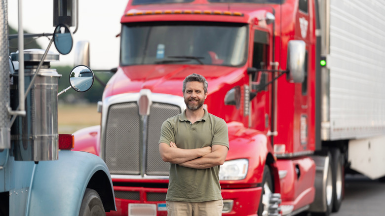 Man standing in front of a semi-truck