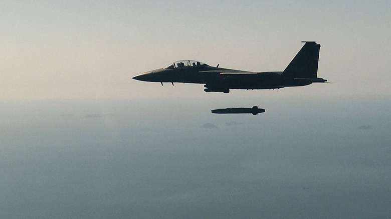 South Korean Air Force F-15K fighter jet flying with a Taurus long-range air-to-surface missile during an exercise on September 12, 2017