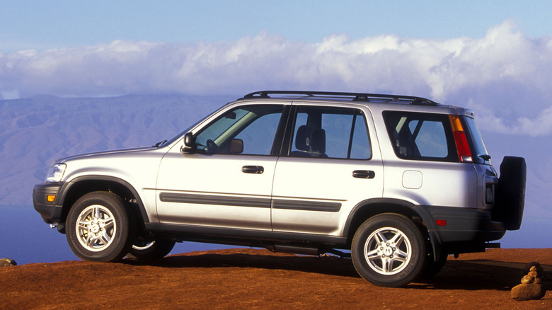 Side view of 1997 Honda CR-V in mountain setting