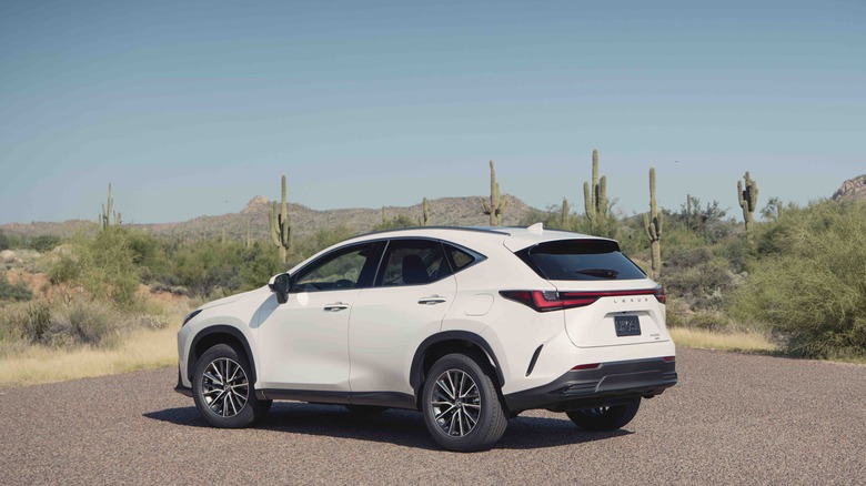 Rear-quarter shot of a white 2023 Lexus NX 250