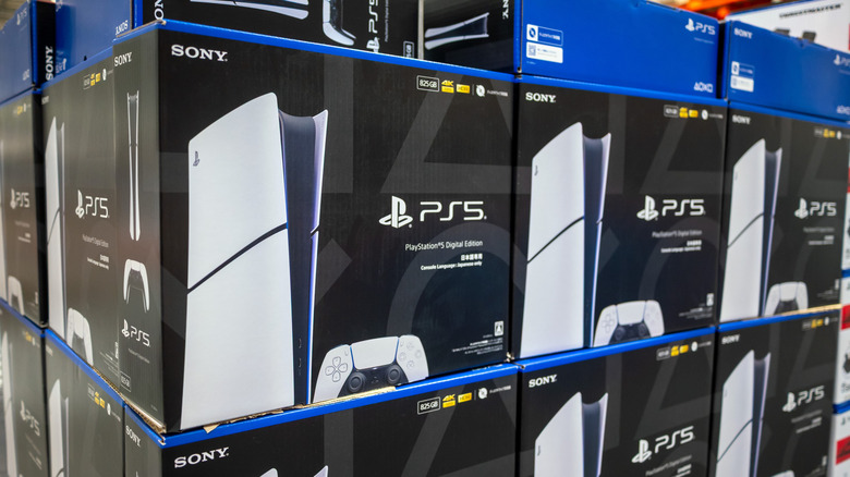 several rows and columns of PlayStation 5 digital edition boxes in a store