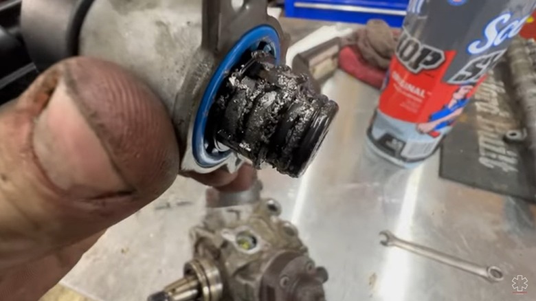 Image showing metal shavings inside a failed CP4 pump after disassembly.