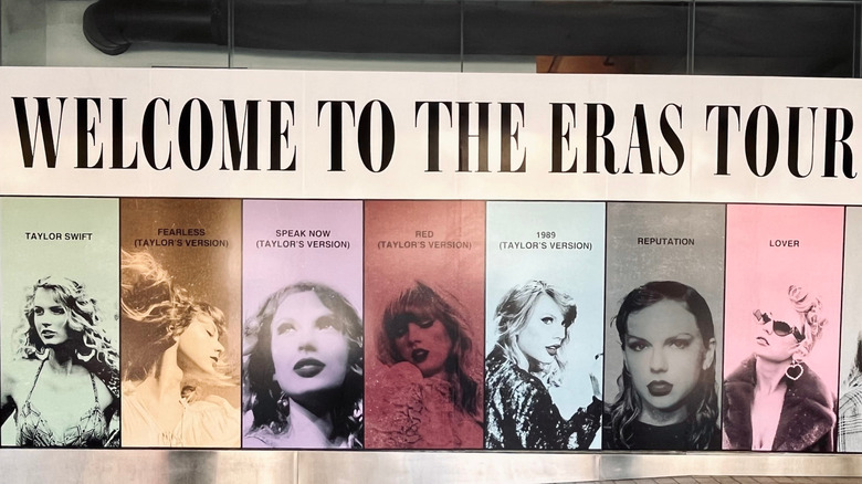 Eras Tour banner featuring photos of Taylor Swift