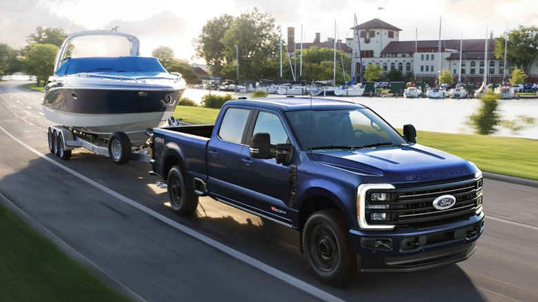 Ford Super Duty towing a boat trailer