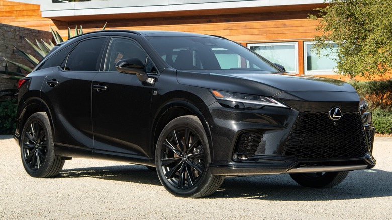 A black 2025 Lexus RX 500h F Sport Performance parked
