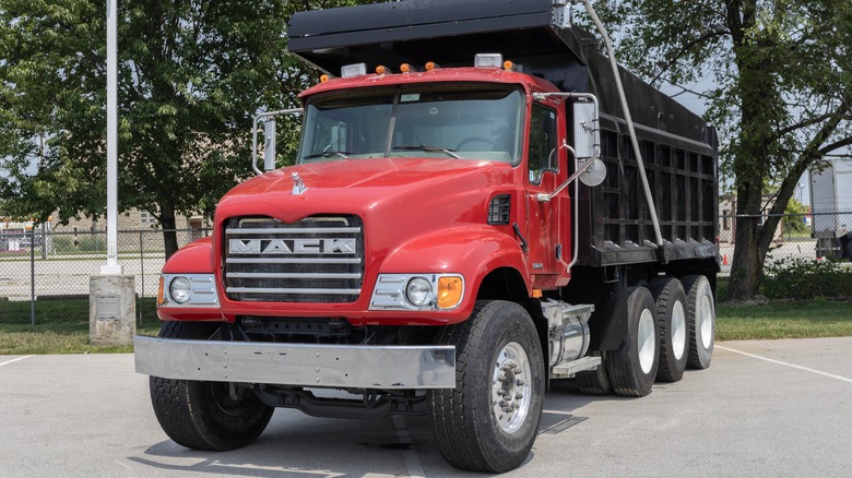 Front shot of a red Mack dump truck