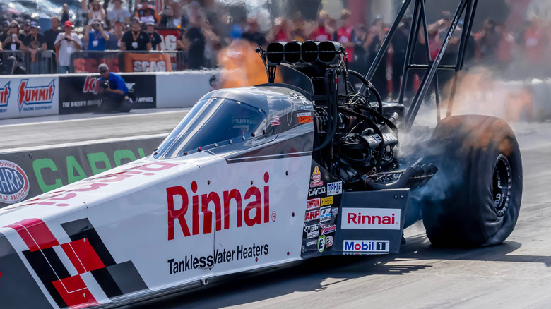 Top fuel dragster on drag strip