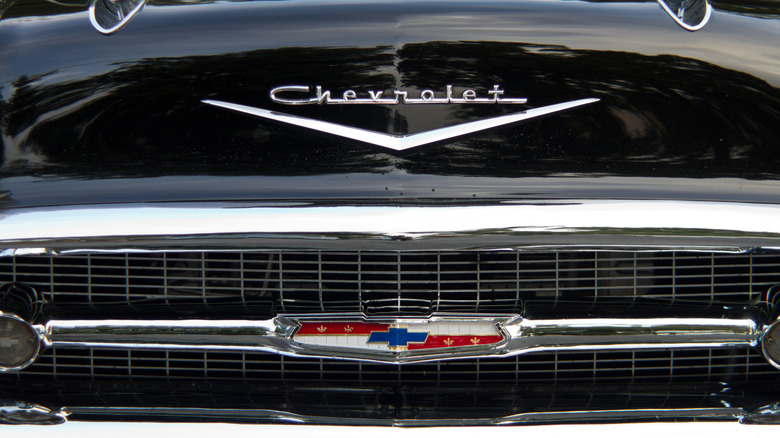 Front bumper view of a Chevrolet badge on a Chevy Bel Air
