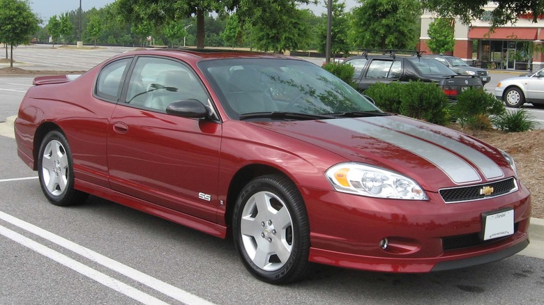 A red 2006-2007 Chevrolet Monte Carlo SS in a parking lot