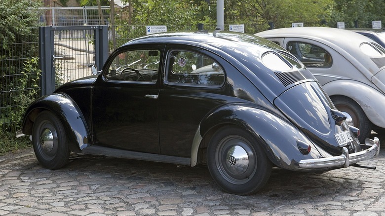 1948 Volkswagen Beetle parked on cobblestones