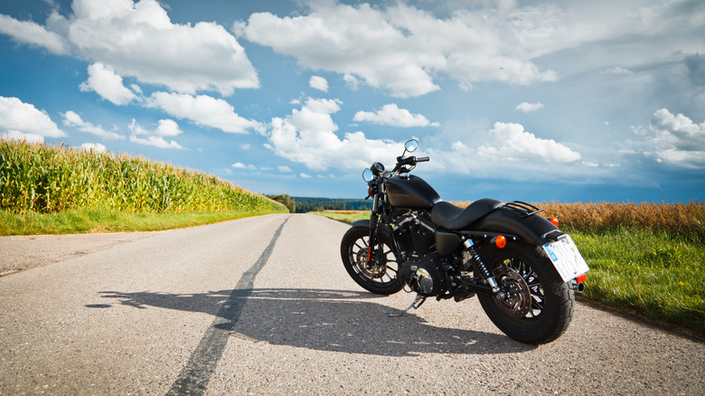 A black motorcycle parked on the road in in sunny Herrenberg, Germany