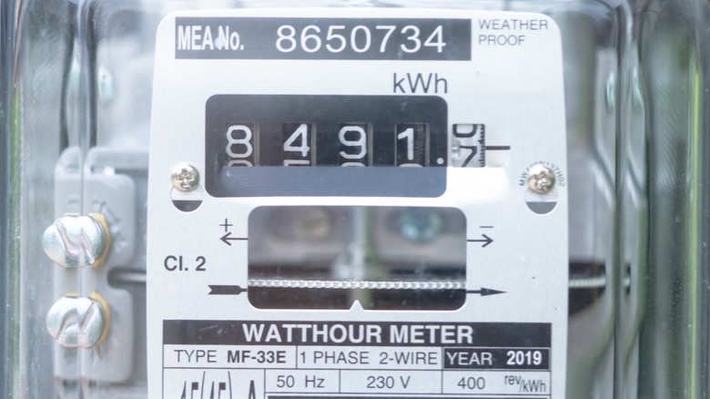 Electric meter showing 8,491.7 kWh used