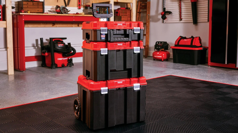 A stack of Craftsman Versastack containers in a workshop.