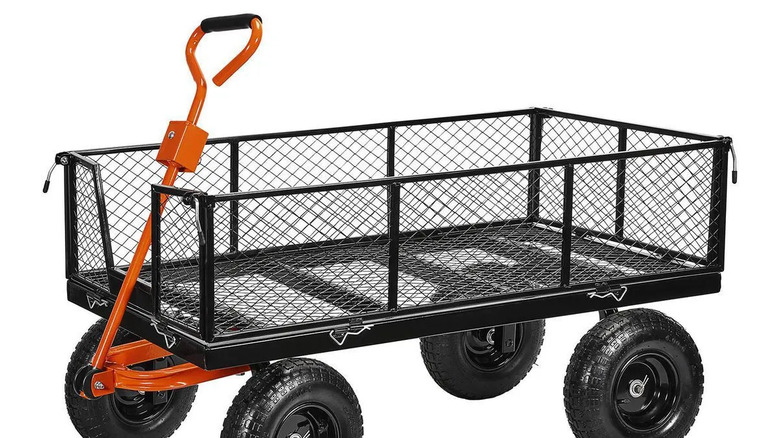 Harbor Freight 10 cubic foot steel utility cart on white background