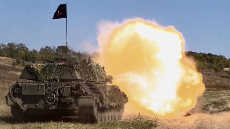 A Leopard 1A5 Main Battle Tank firing its main gun