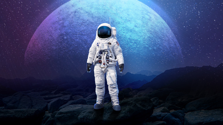 Astronaut in space standing on a planet