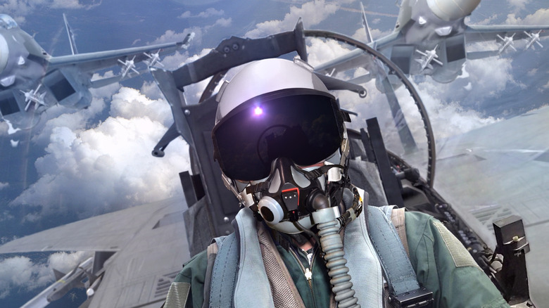 Pilot in a fighter jet cockpit
