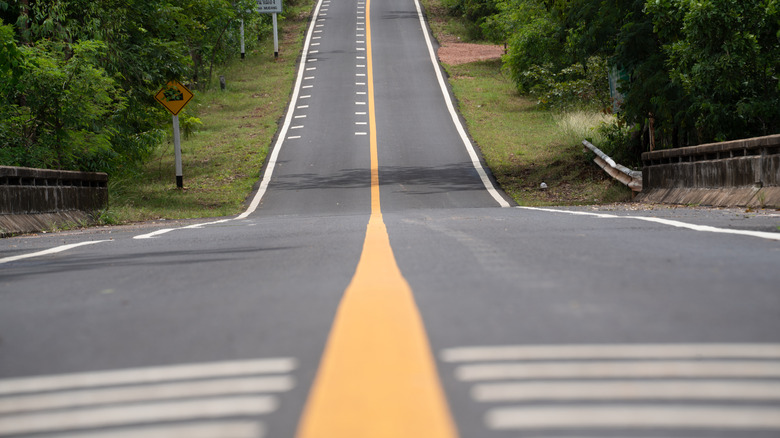 A straight steep marked road, low angle