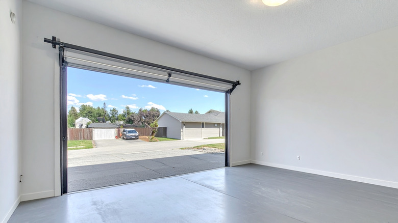 Clean garage with shutter door rolled up