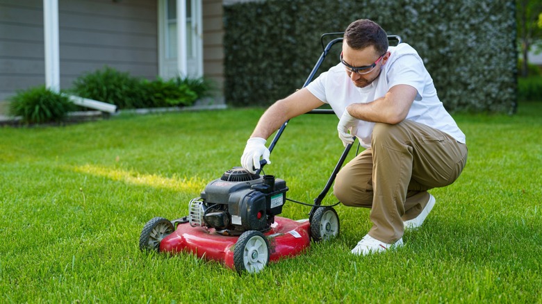 Maintaining a lawn mower engine.