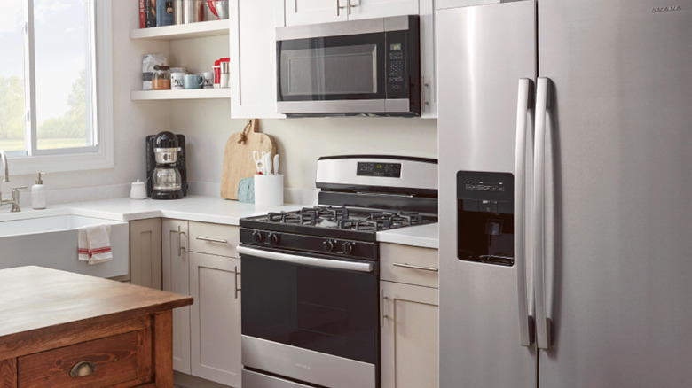 A kitchen stocked with Amana appliances.