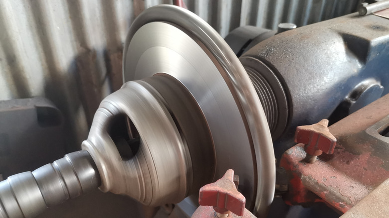 Resurfacing a brake rotor using a brake lathe