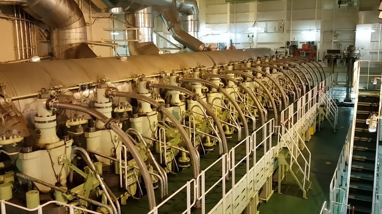 Wärtsilä RT-Flex96C inside a cargo ship, showing diesel injectors and maintenance catwalks