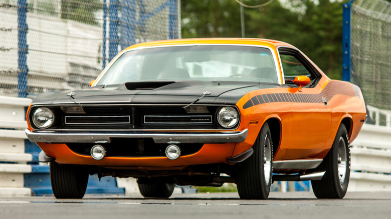 Front 3/4 view of orange 1970 AAR 'Cuda on track