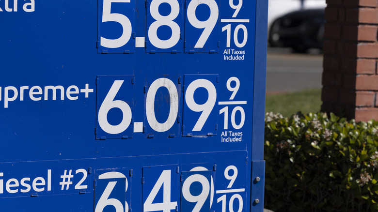 A Mobile gas station sign displaying gas prices over $5.00