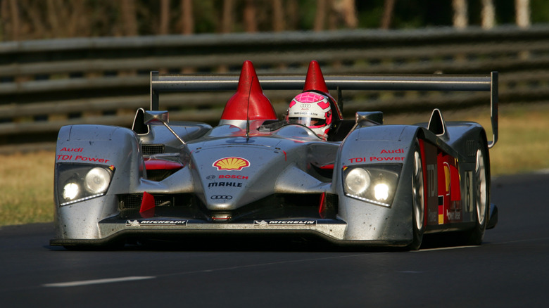 Front 3/4 view of Audi R10 racing at Le Mans