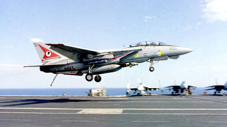 An F-14 "Tomcat" Assigned To The "Top Hatters" Prepares To Make An Arrested Landing