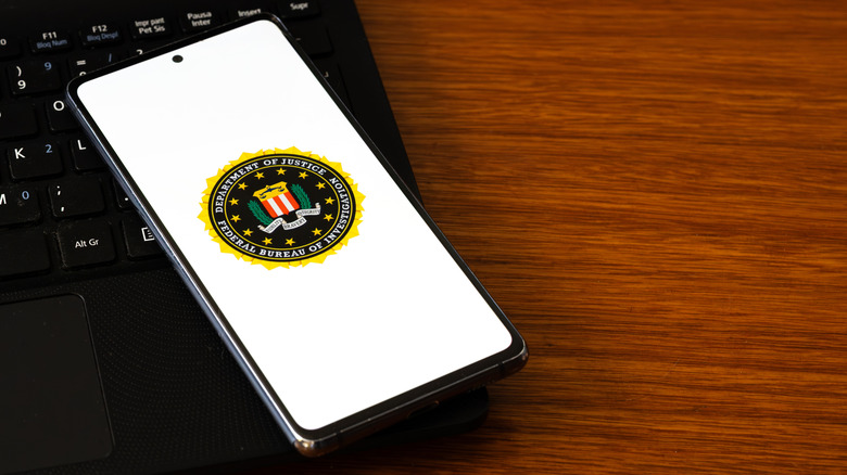 Phone displaying the FBI logo