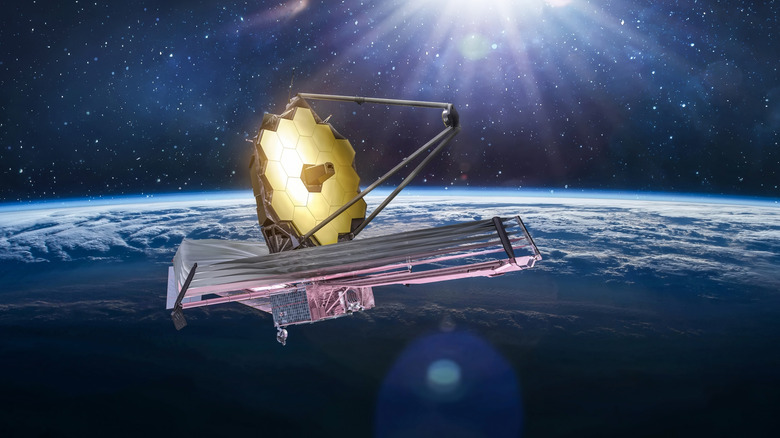 James Webb telescope in outer space on orbit of Earth
