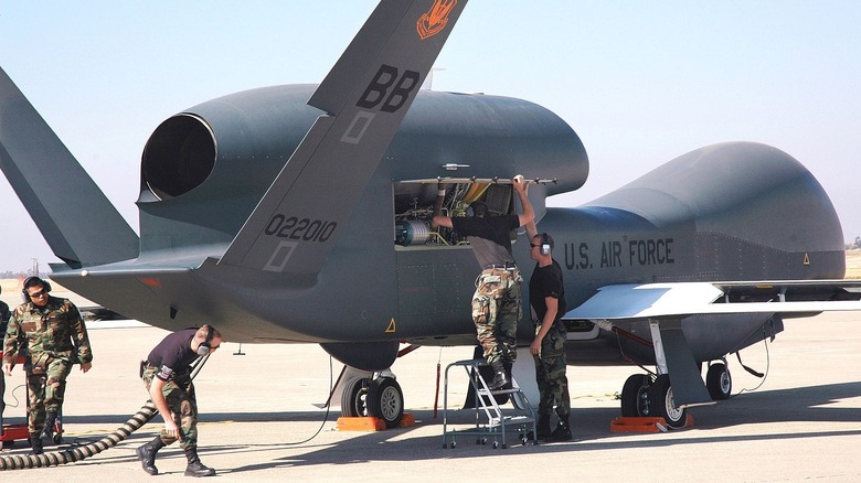An RQ-4A UAV undergoes servicing