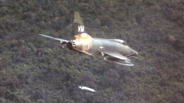 A North American F-100D drops a napalm bomb in South Vietnam